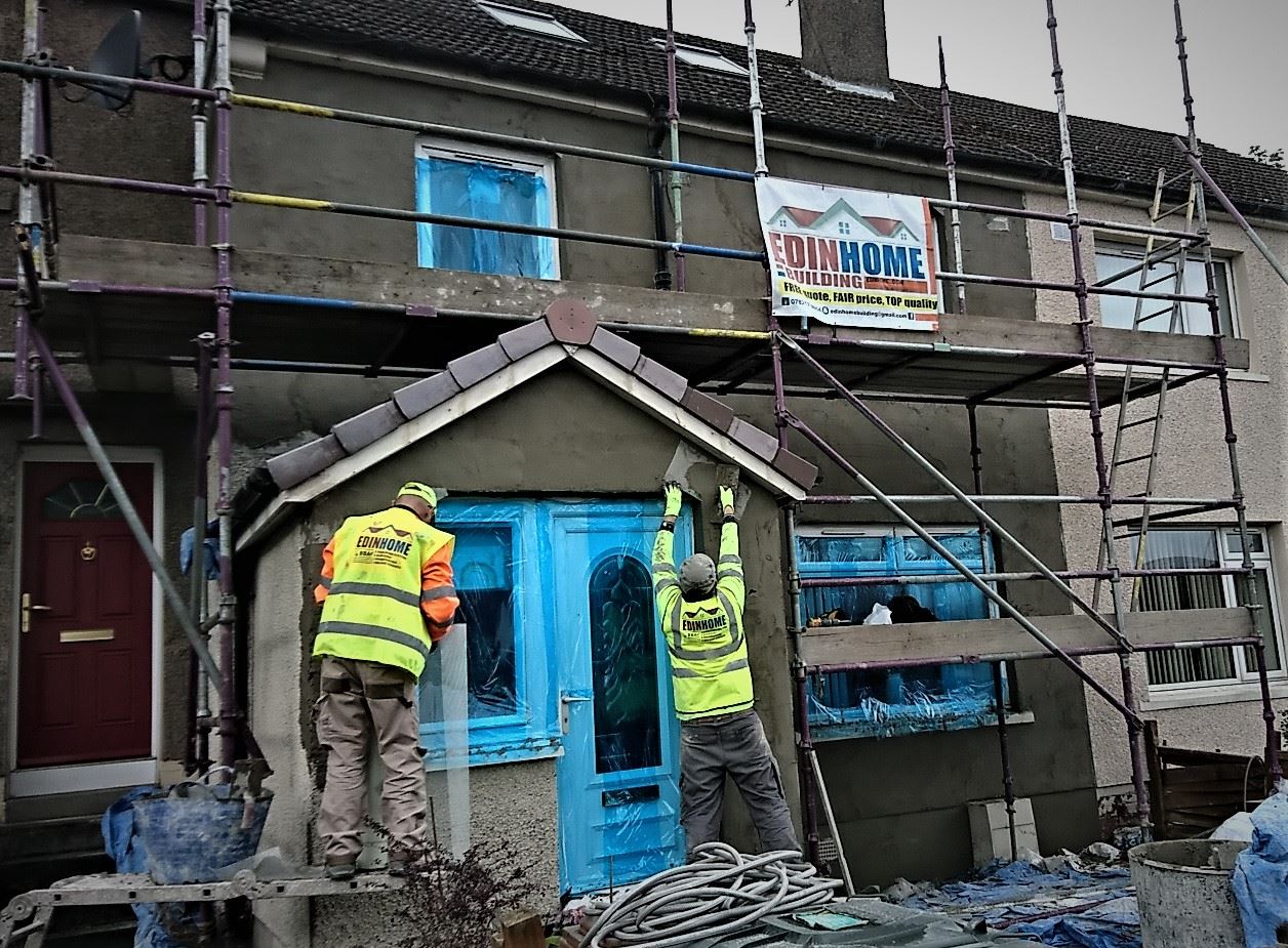 workers fixing facade with roughcast render Edinburgh
