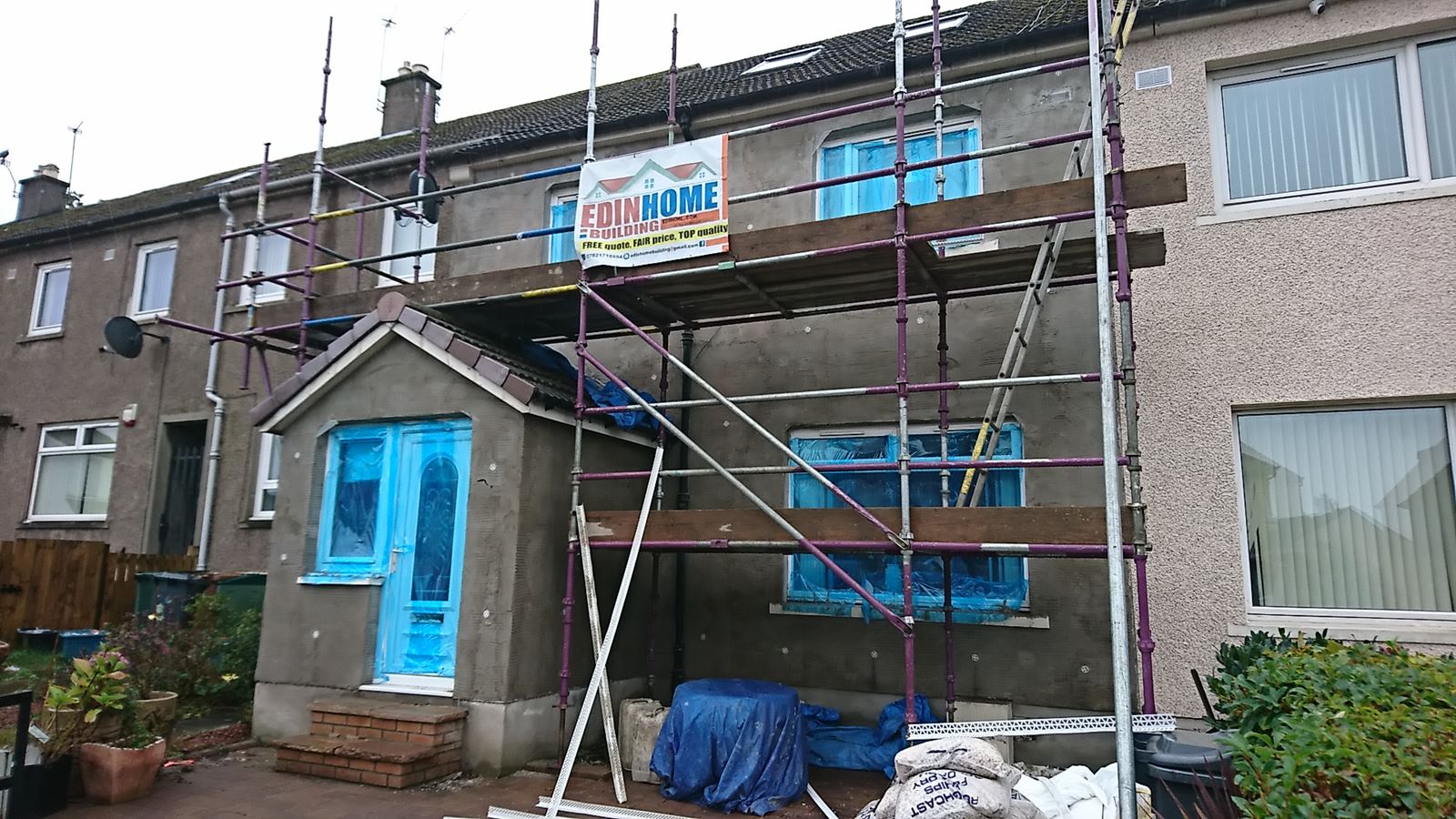 scaffolded wall upgraded with solid wall insulation Edinburgh