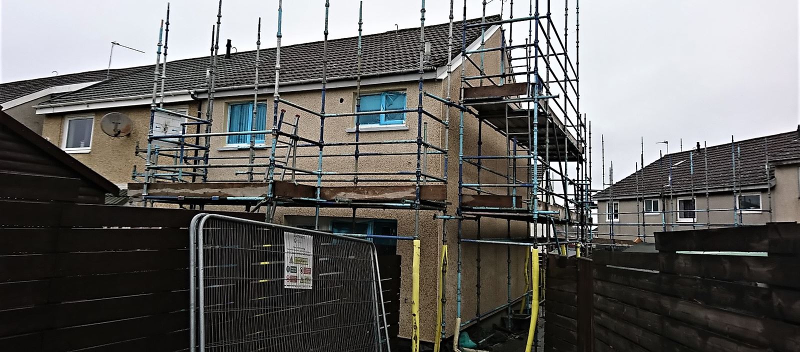 scaffolded terrace houses in rendering Edinburgh