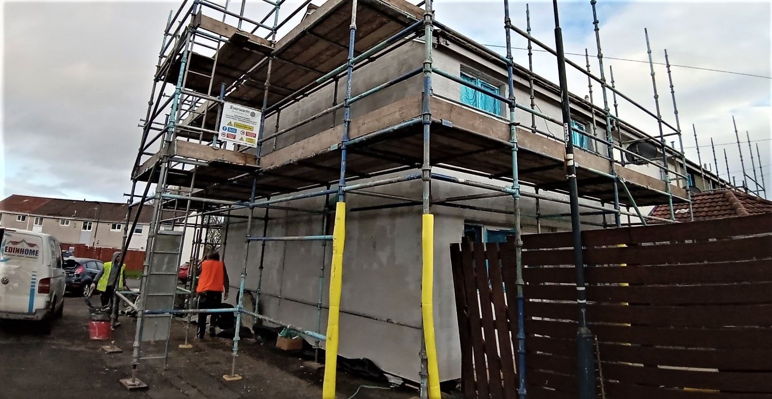 scaffolded house undergoing roughcasting Edinburgh