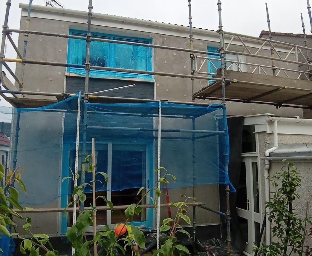 rendering Edinburgh applied to the exterior of a building near windows
