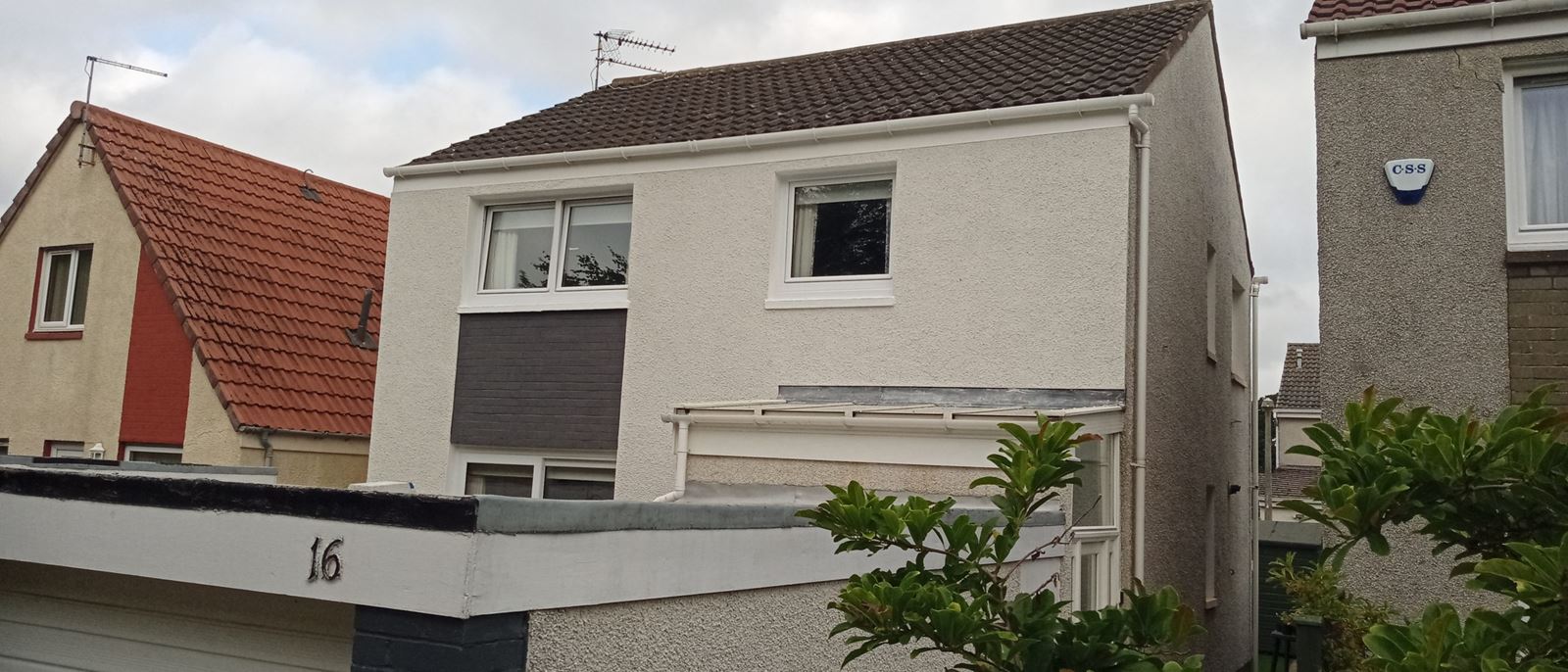 rendering Edinburgh on the side of a house near the door