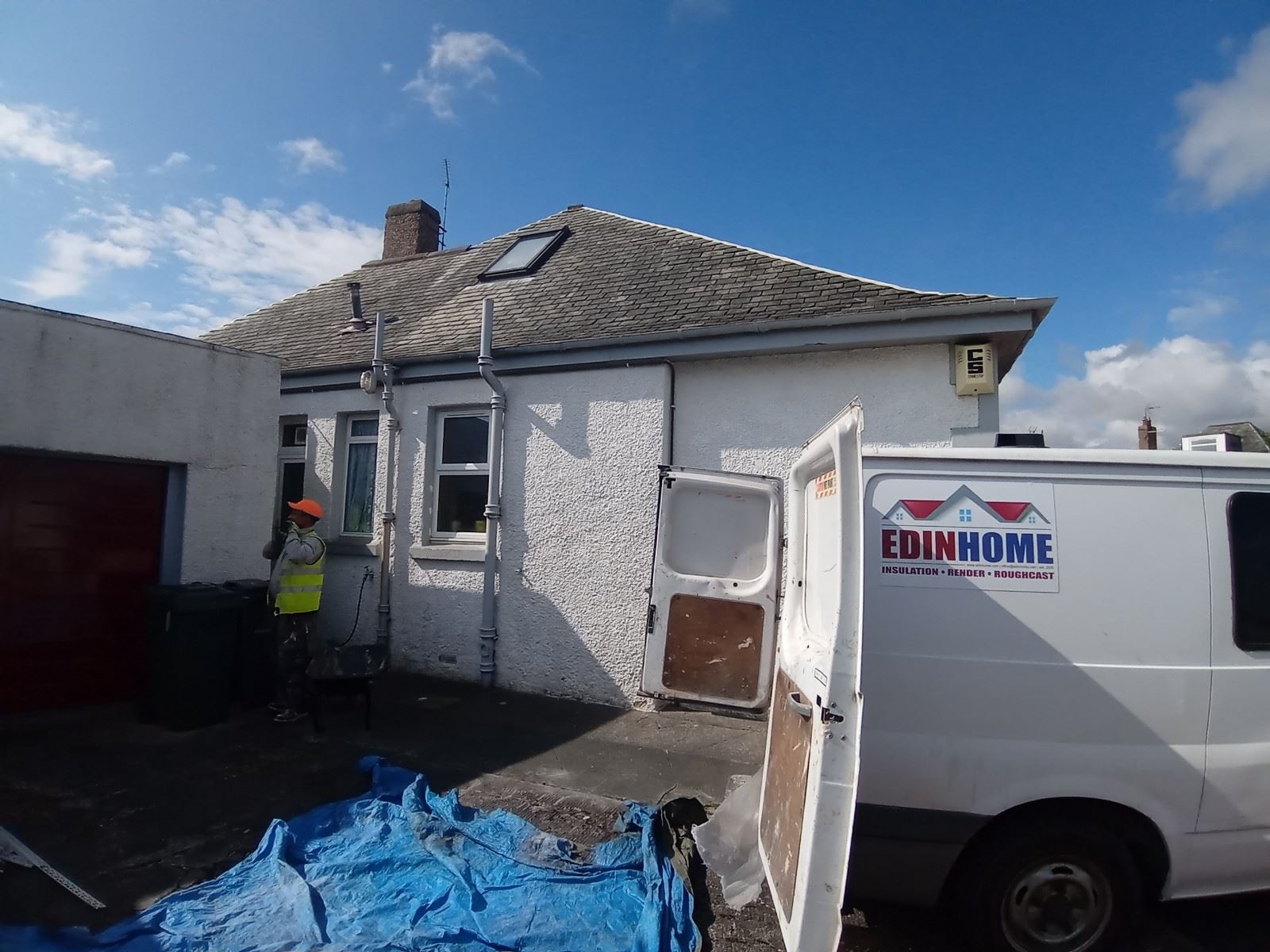 rendering Edinburgh on the side of the house near a door and window