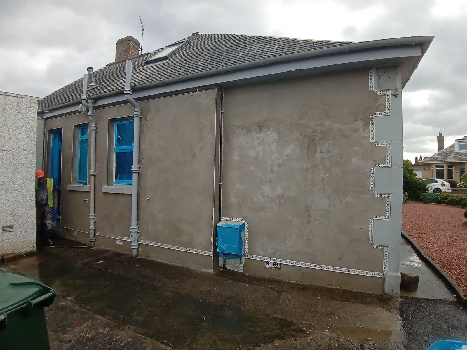 roughcast render Edinburgh on the side of the house near the entrance