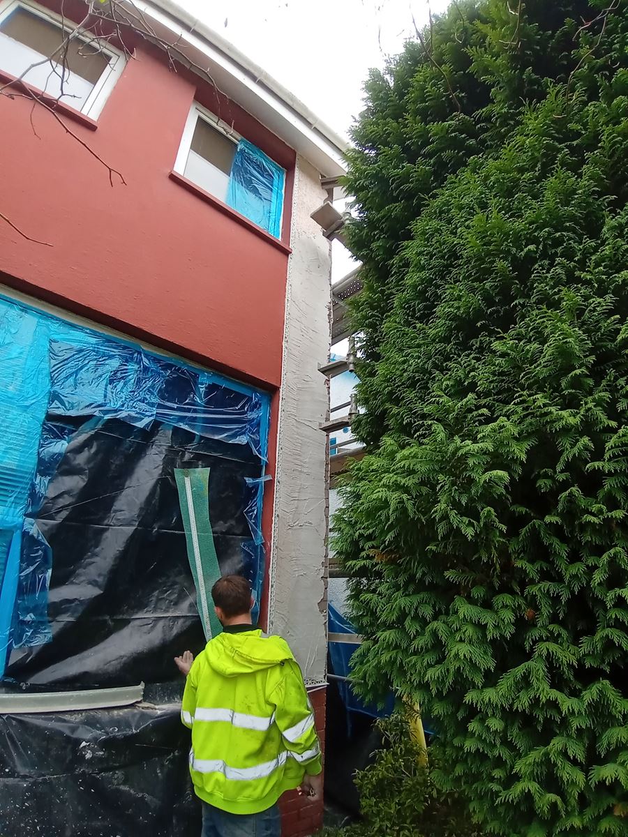 rendering Edinburgh around a building exterior with scaffolding visible