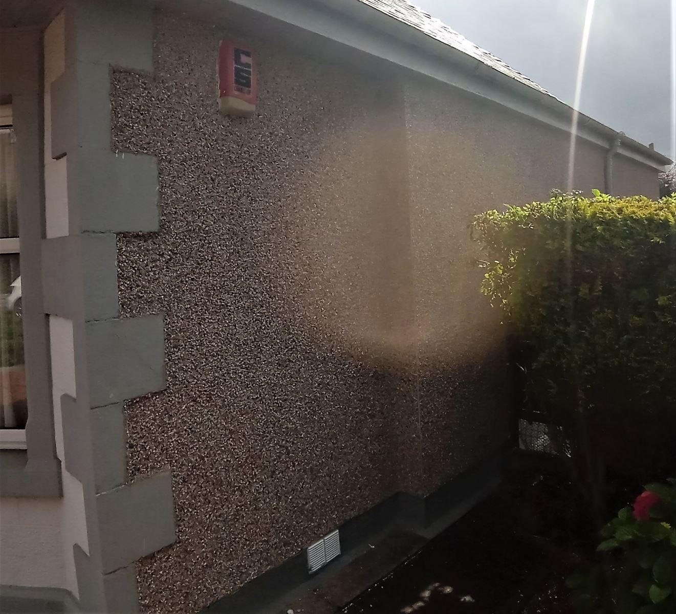 rendering Edinburgh on the side of a house with scaffolding visible