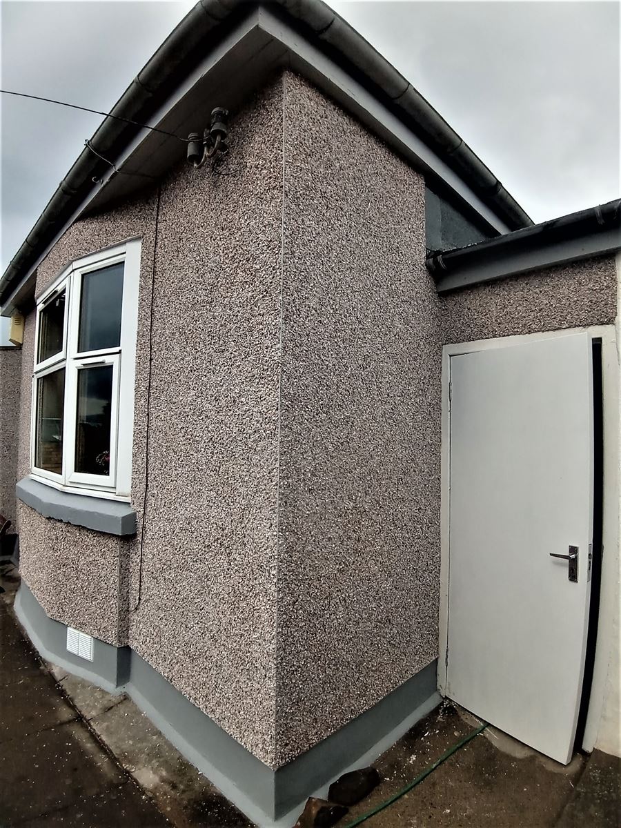 roughcast render Edinburgh applied to the wall near the entrance