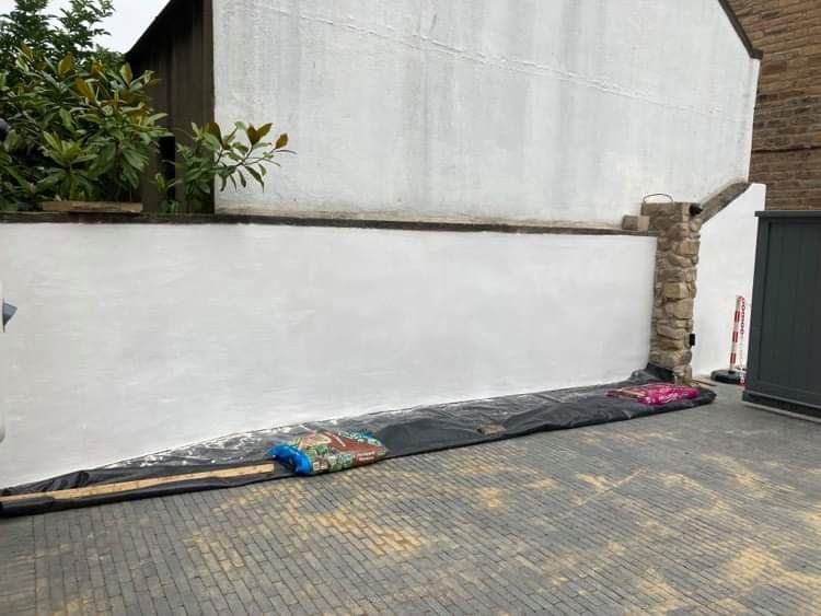 roughcast render Edinburgh applied on the corner of a house wall