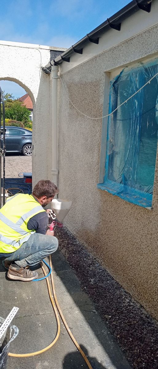 house rendering Edinburgh near a garage and finished surface
