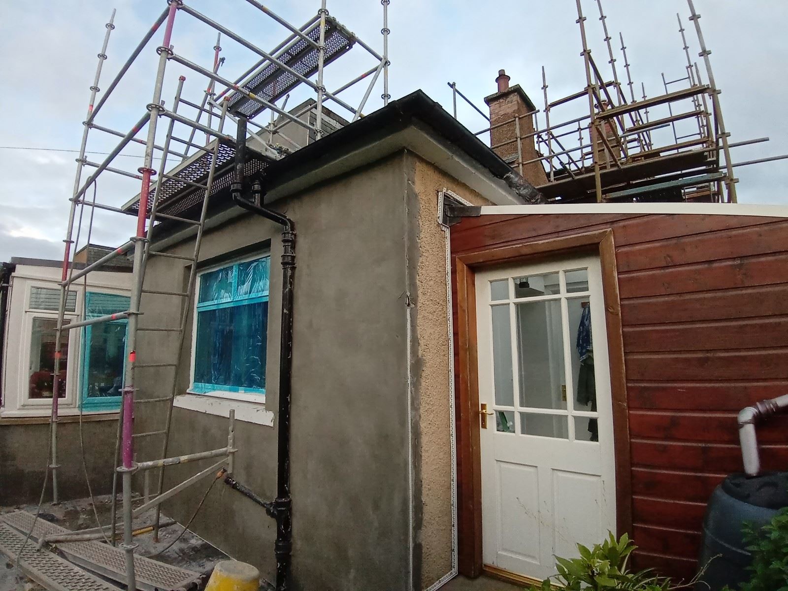 roughcast render Edinburgh applied to a house with new windows