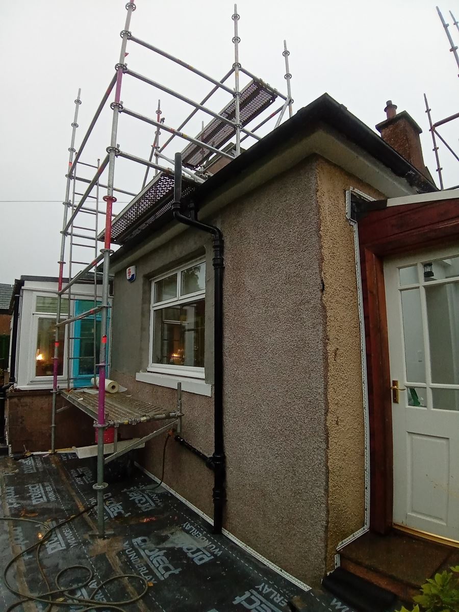 rendering Edinburgh on a building exterior with scaffolding