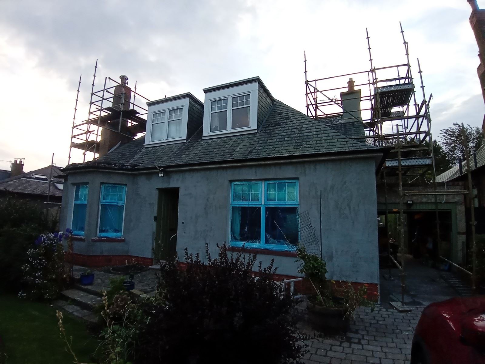 roughcast render Edinburgh applied around windows and roofline