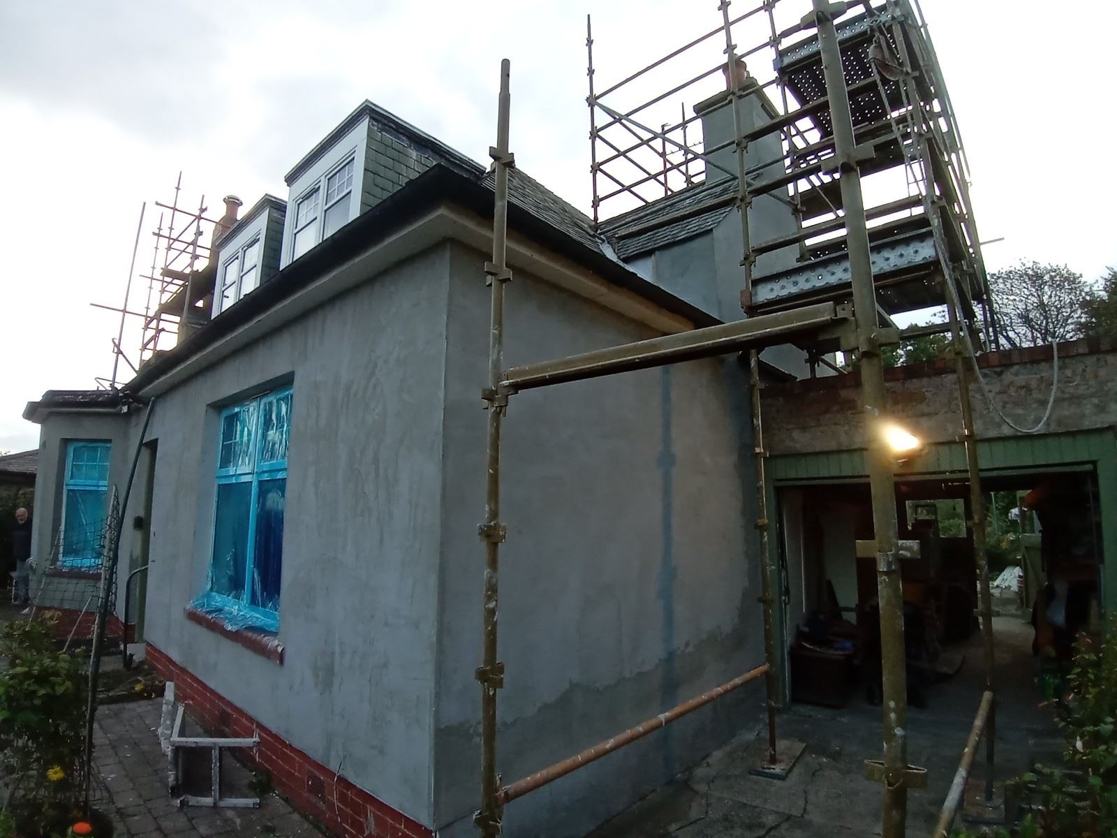 rendering Edinburgh being completed on a house exterior