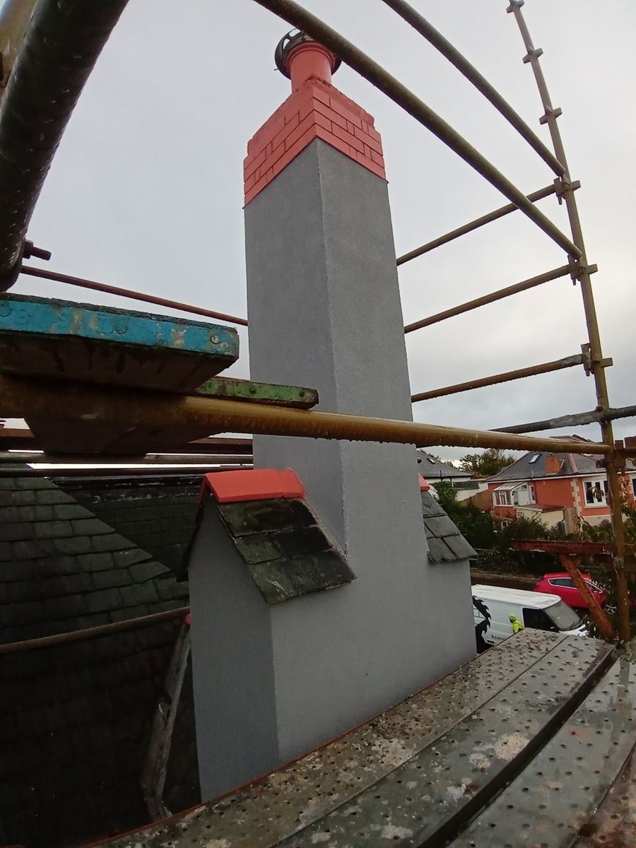 roughcast render repair on a chimney structure