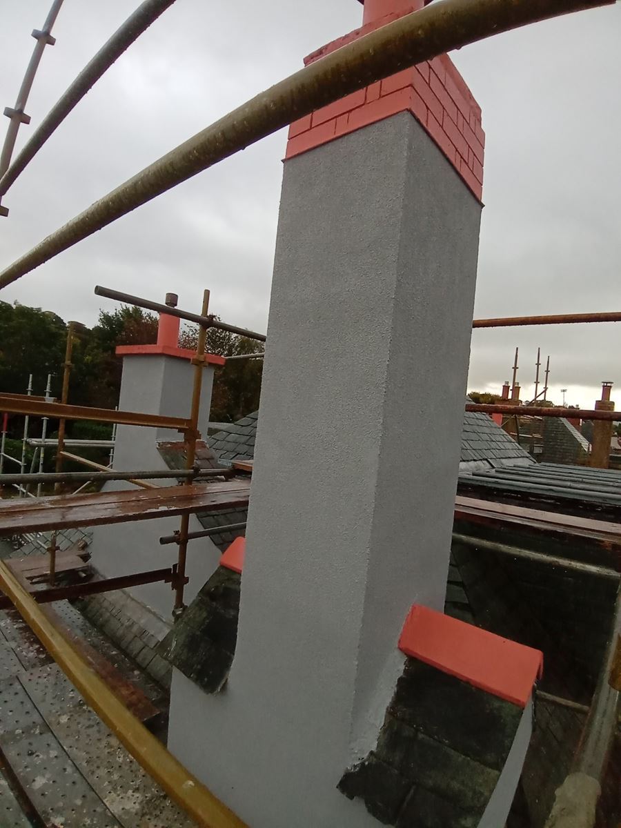 roughcast repair Edinburgh with scaffolding around the building