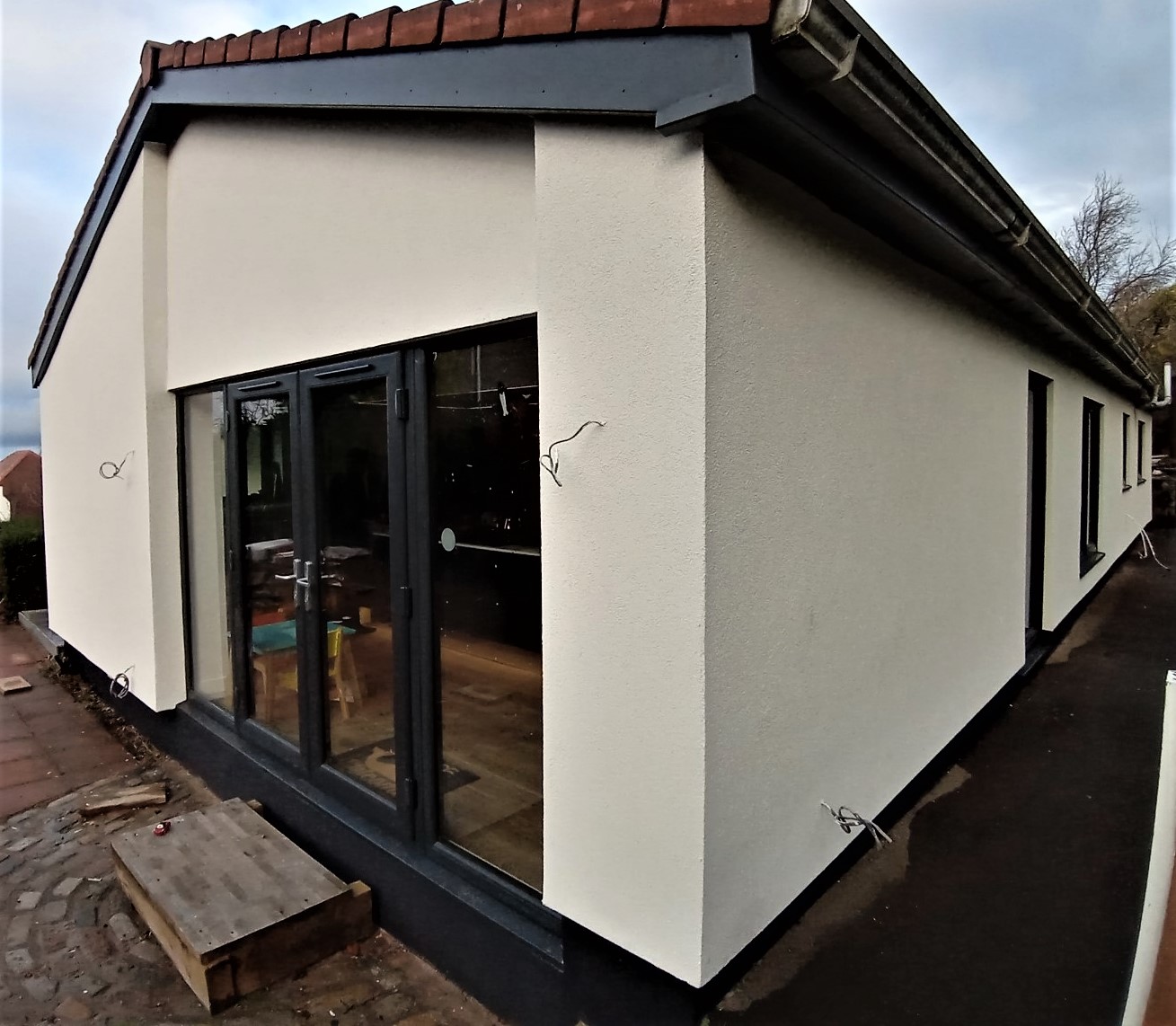 entrance area after roughcast render repair