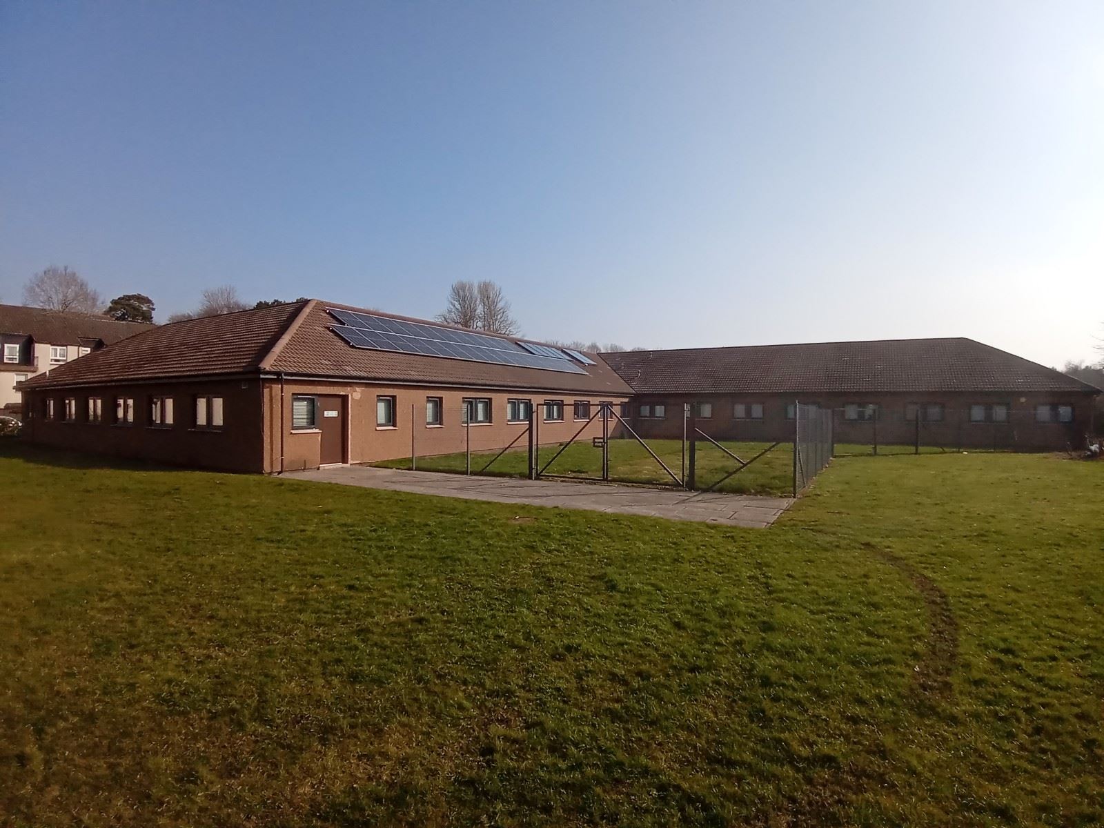 lawn view across roughcast repair project