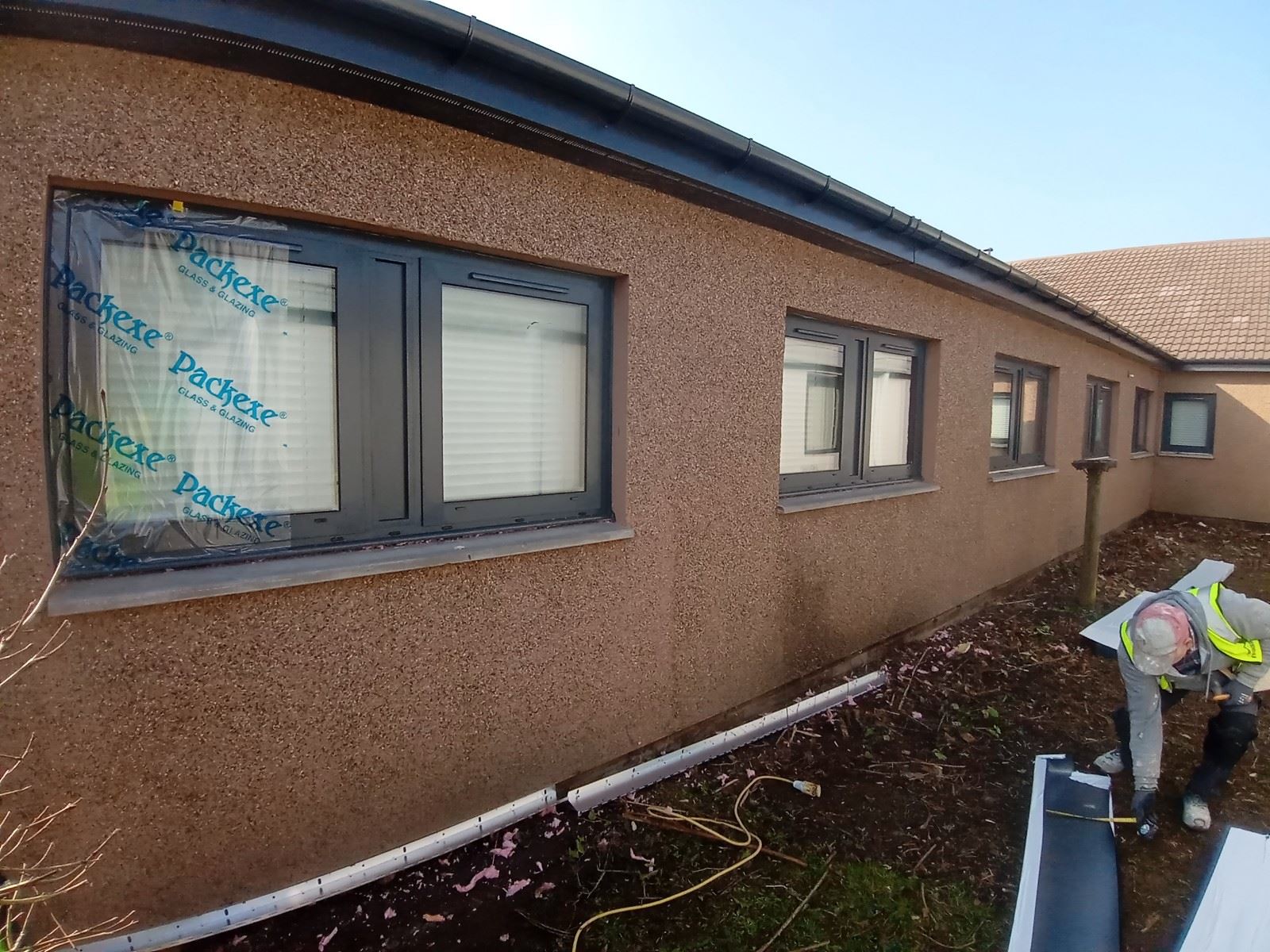 window section completed by roughcast render edinburgh