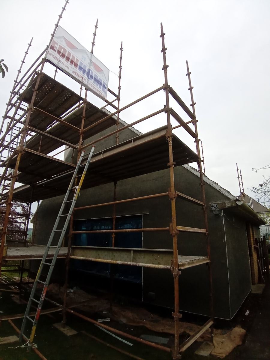 shaded gable showing roughcast repair