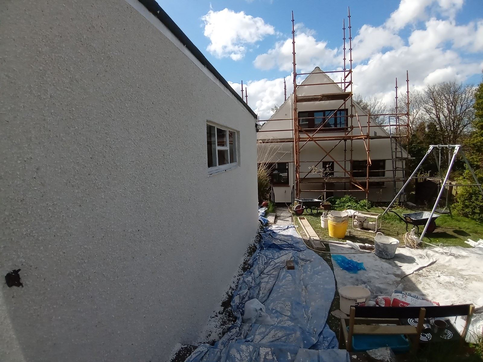 narrow path by external wall insulation edinburgh