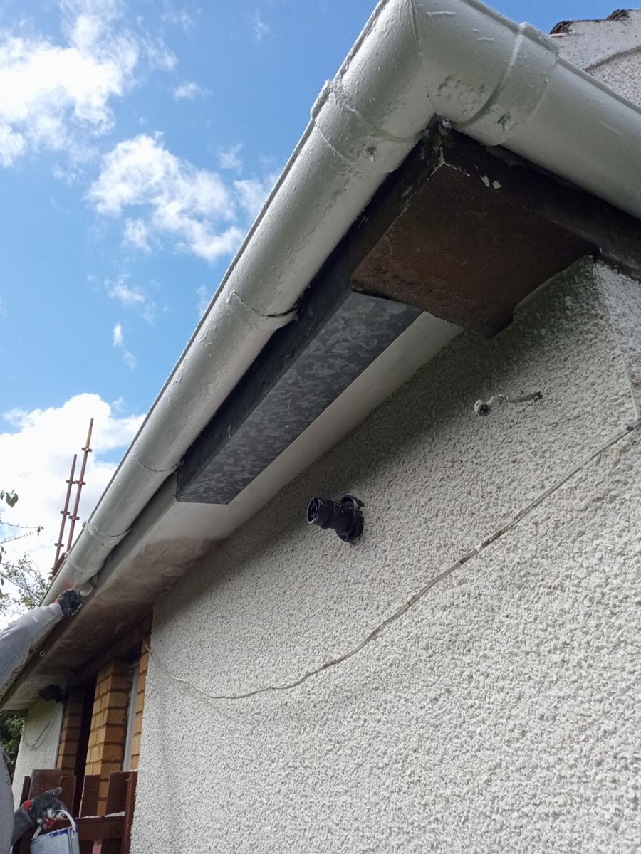 soffit detail during roughcast repair