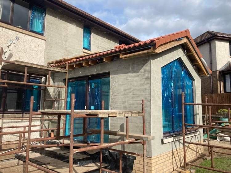 external wall insulation Edinburgh on rear extension wall with scaffolding