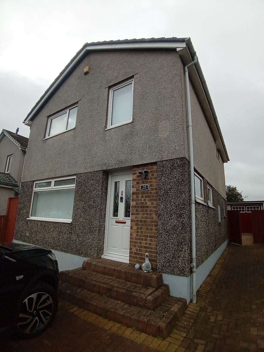 Insulation Edinburgh beneath fresh render on entrance elevation