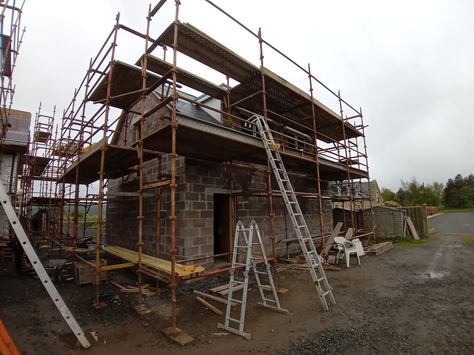 solid wall insulation Edinburgh on corner elevation with timber boards