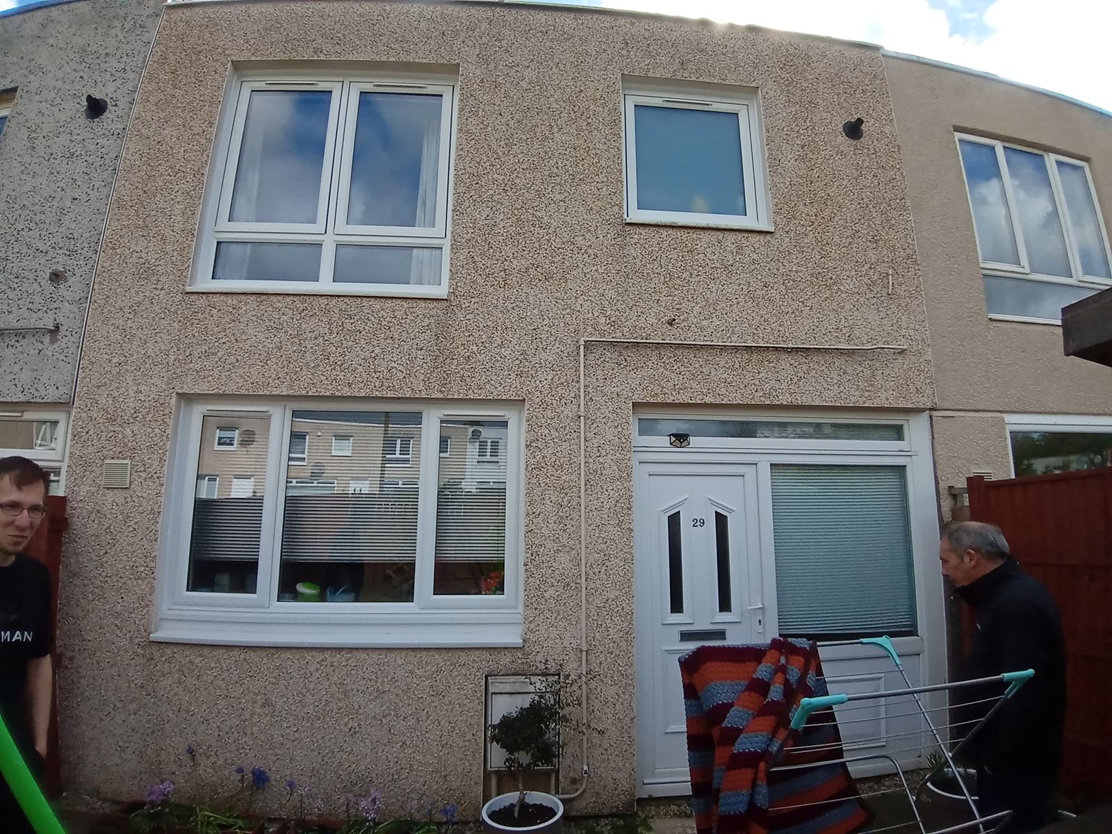 external wall insulation Edinburgh on façade with banner during works
