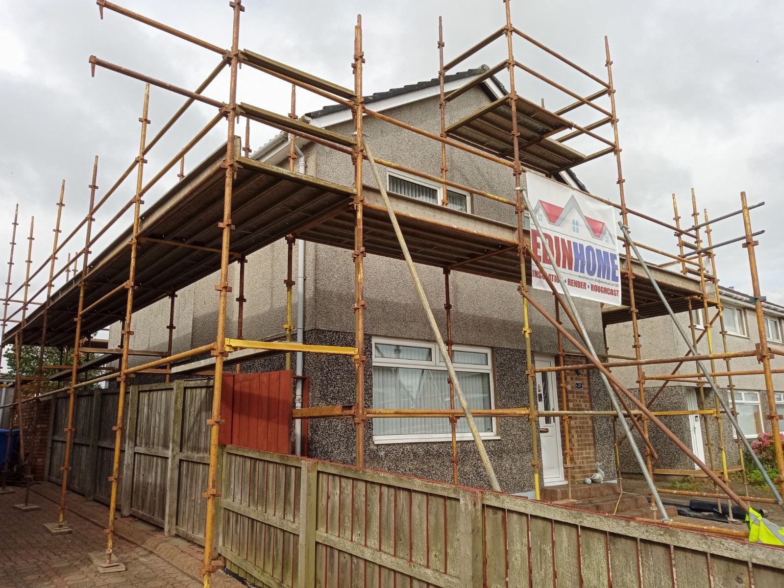 Insulation Edinburgh project mid-stage on scaffolded house wall
