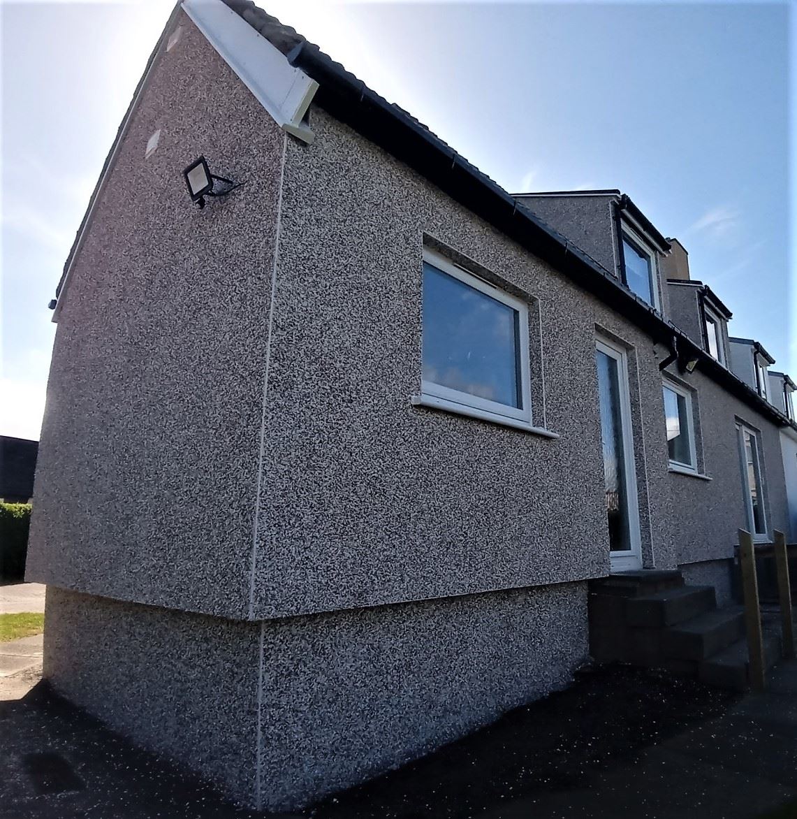 Insulation Edinburgh beneath pebble dashed exterior wall