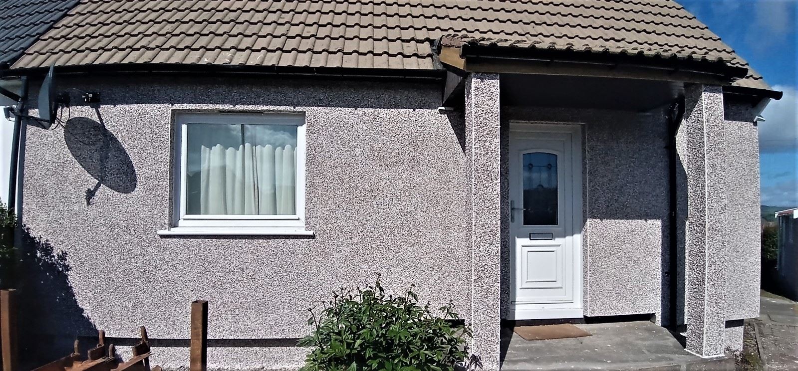 Rendering Edinburgh on front wall with small window and white door