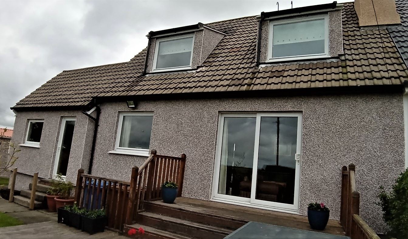 roughcast render Edinburgh on rear extension with sliding doors
