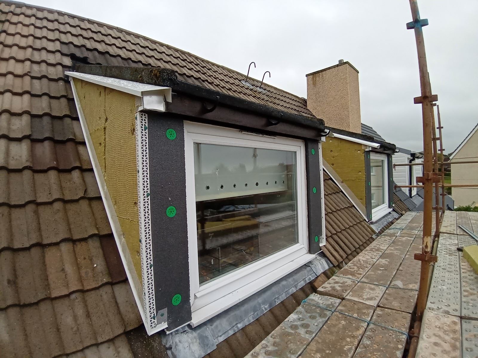 external wall insulation Edinburgh in progress around window frame
