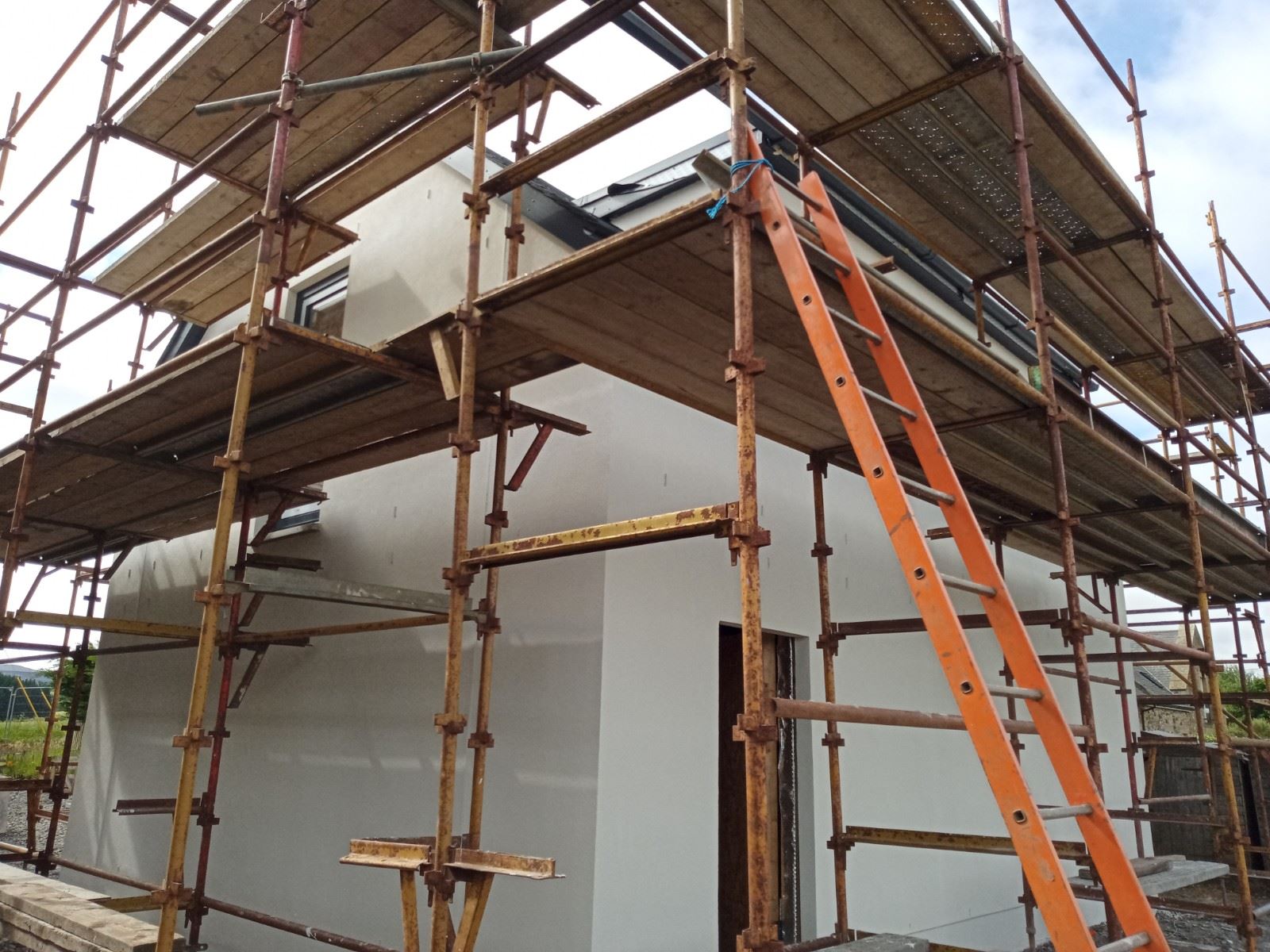 external wall insulation Edinburgh applied on scaffolded side elevation