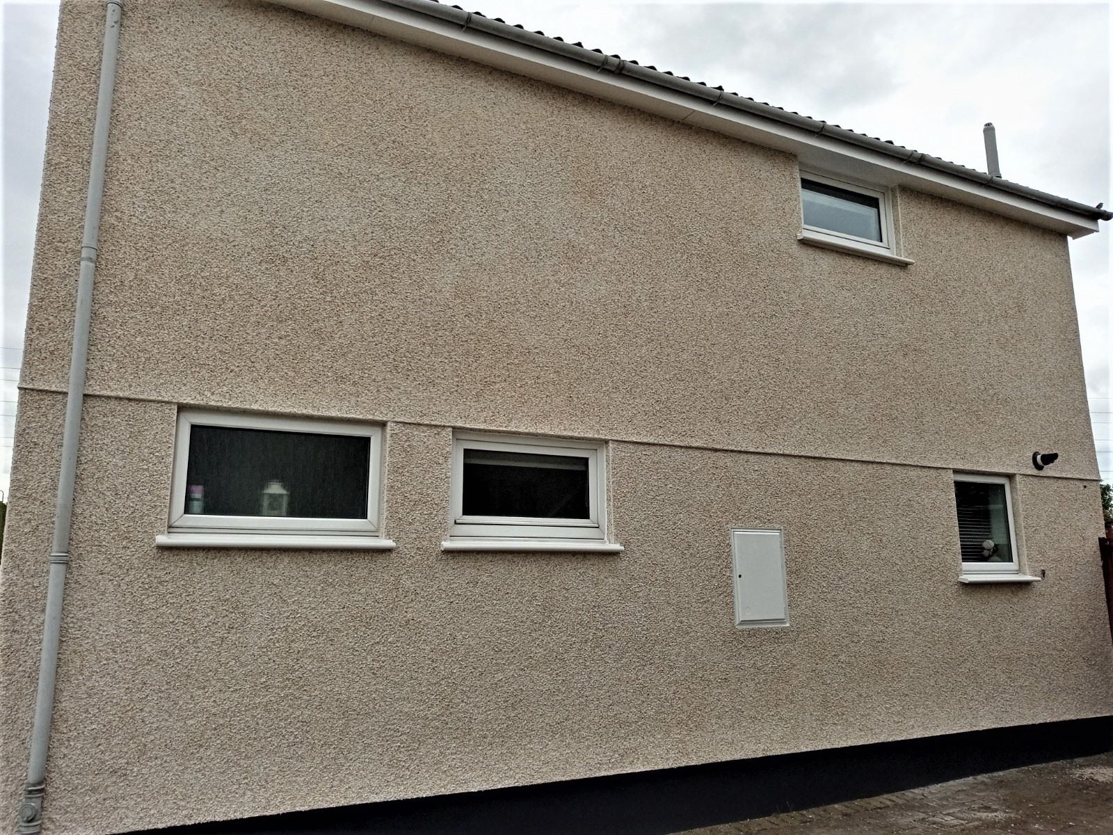 external wall insulation Edinburgh on clean side elevation with windows