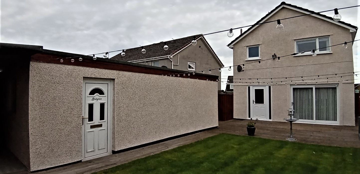 Rendering Edinburgh on long garden wall of family home
