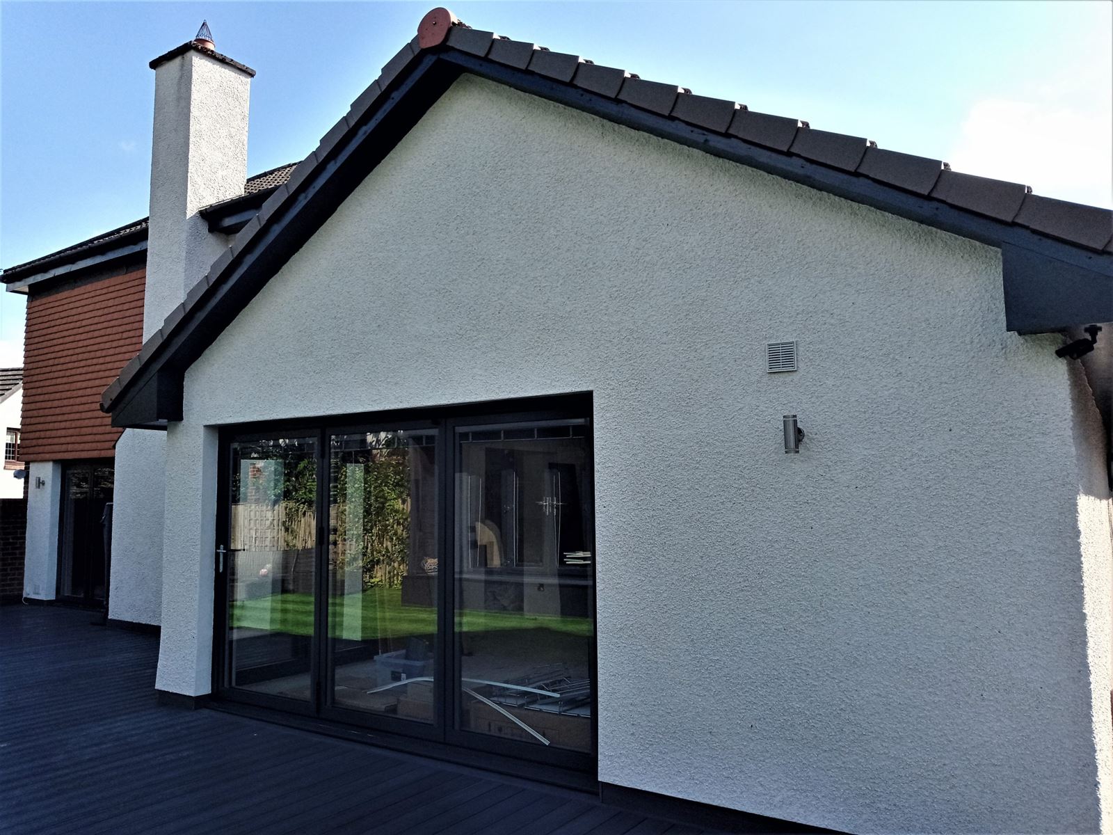 Insulation Edinburgh beneath smooth white gable wall render