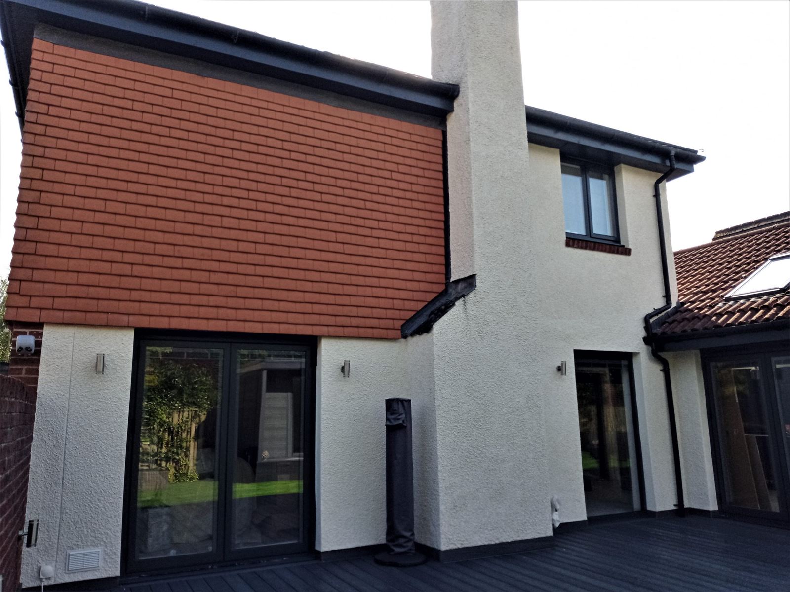 house rendering Edinburgh on side wall with tall chimney