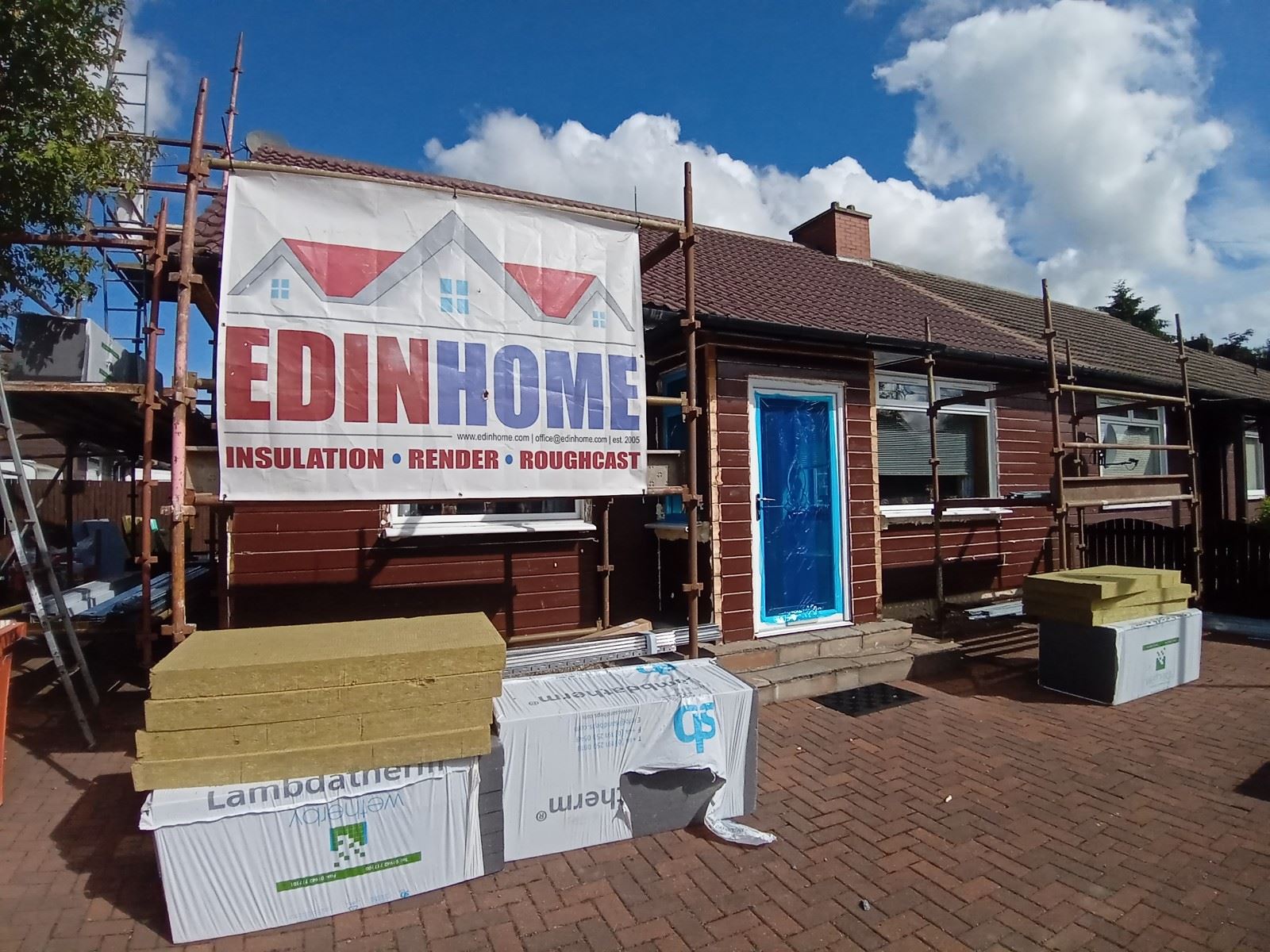 solid wall insulation Edinburgh project with materials stacked by wall