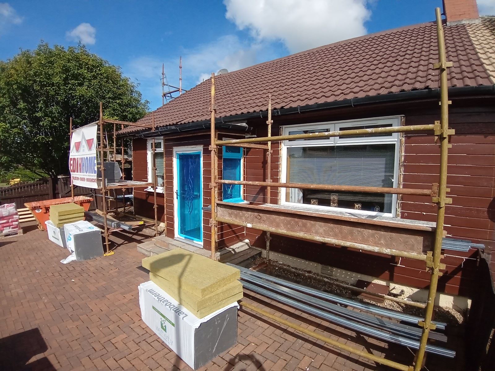 external wall insulation Edinburgh on rear house elevation with panels