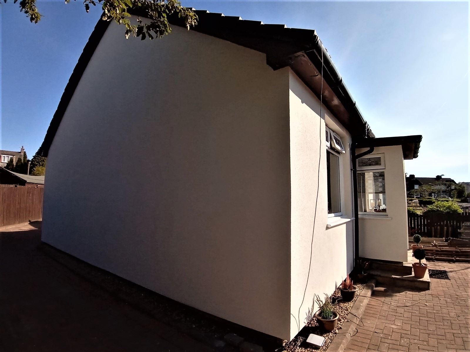 house rendering Edinburgh on rear façade with smooth finish