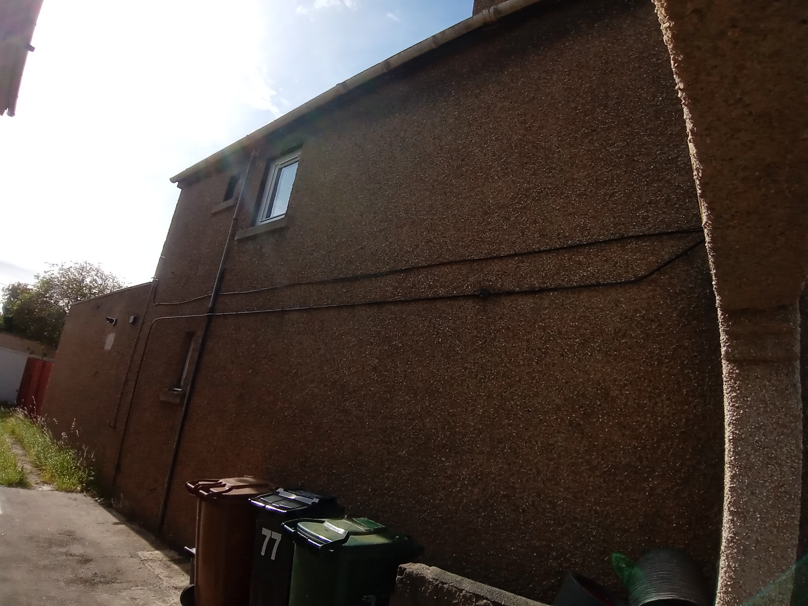 roughcast render Edinburgh on side elevation with visible wiring
