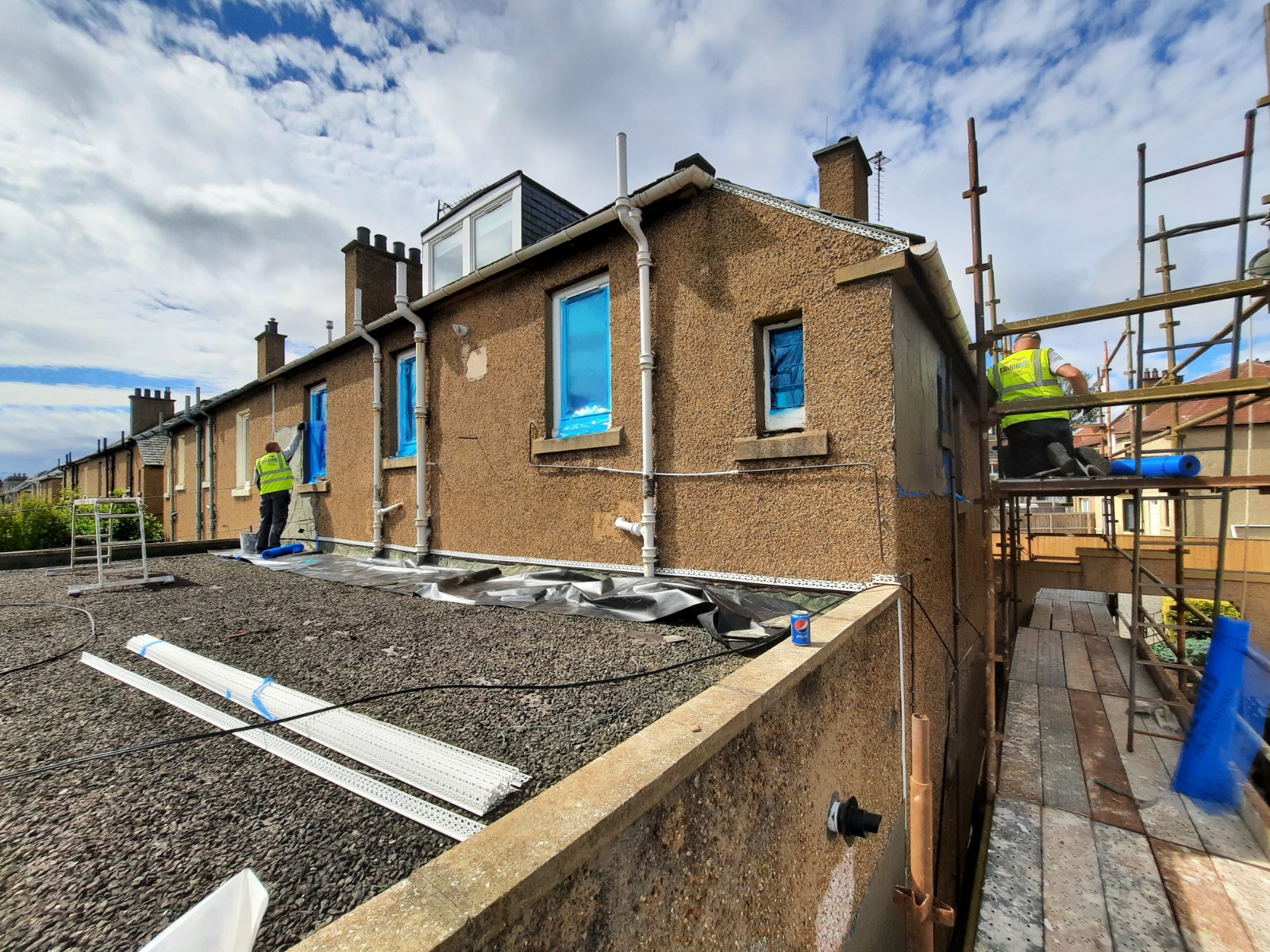 external wall insulation Edinburgh applied to tall gable under scaffolding