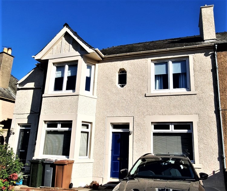 house rendering Edinburgh on front elevation with blue entrance door