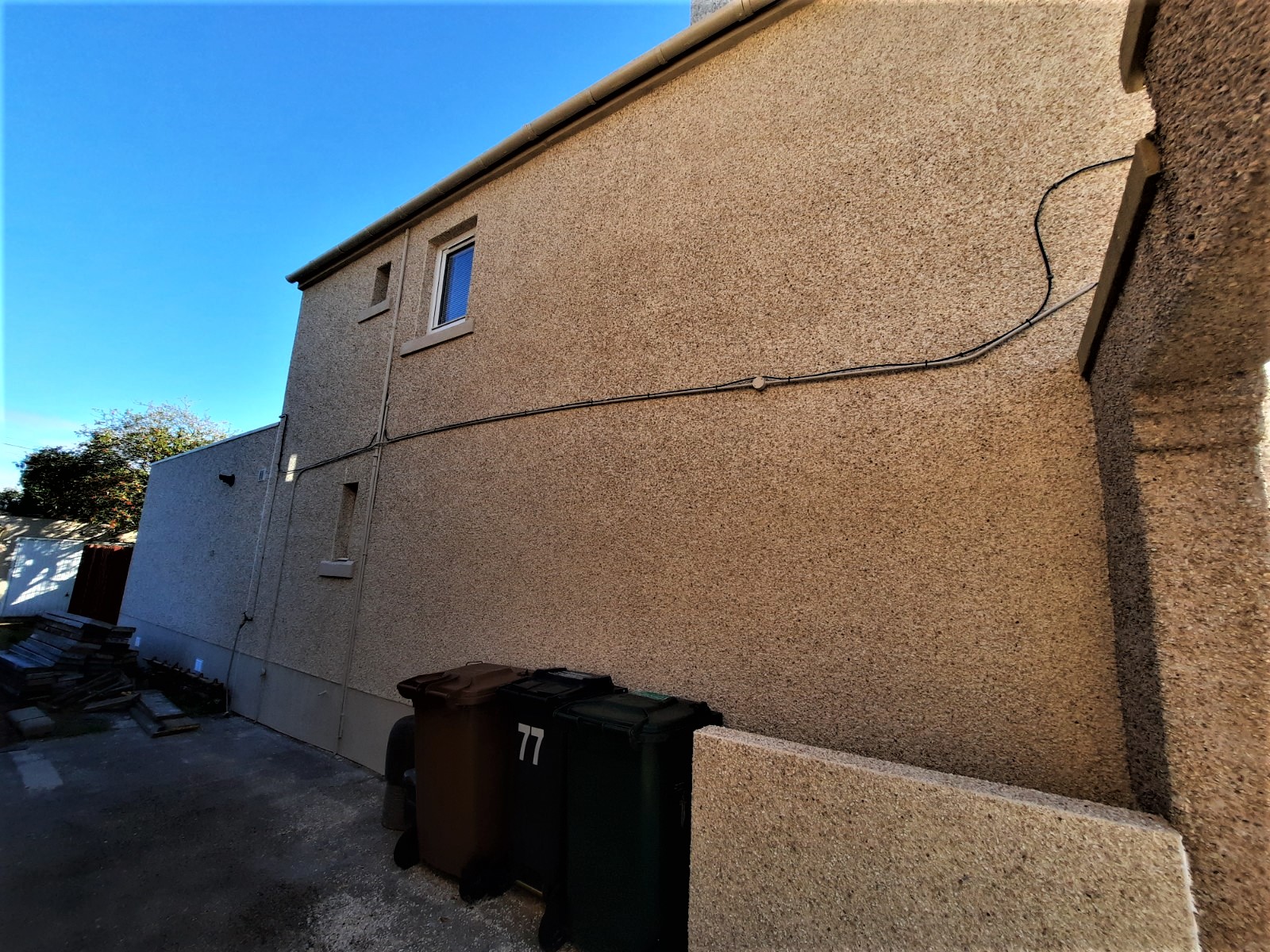 roughcaster Edinburgh repairing long side elevation wall