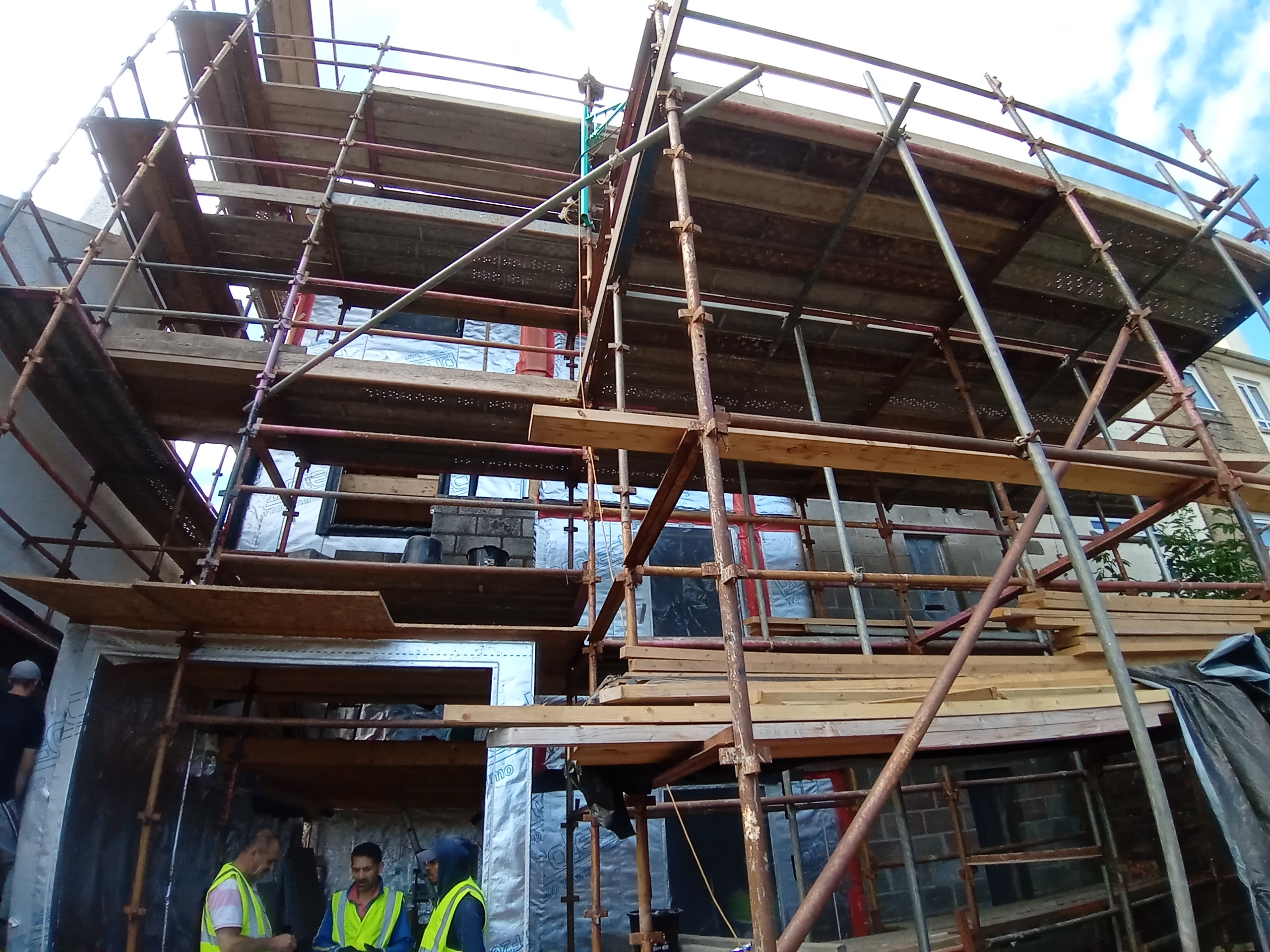 external wall insulation Edinburgh on high-rise scaffolded façade