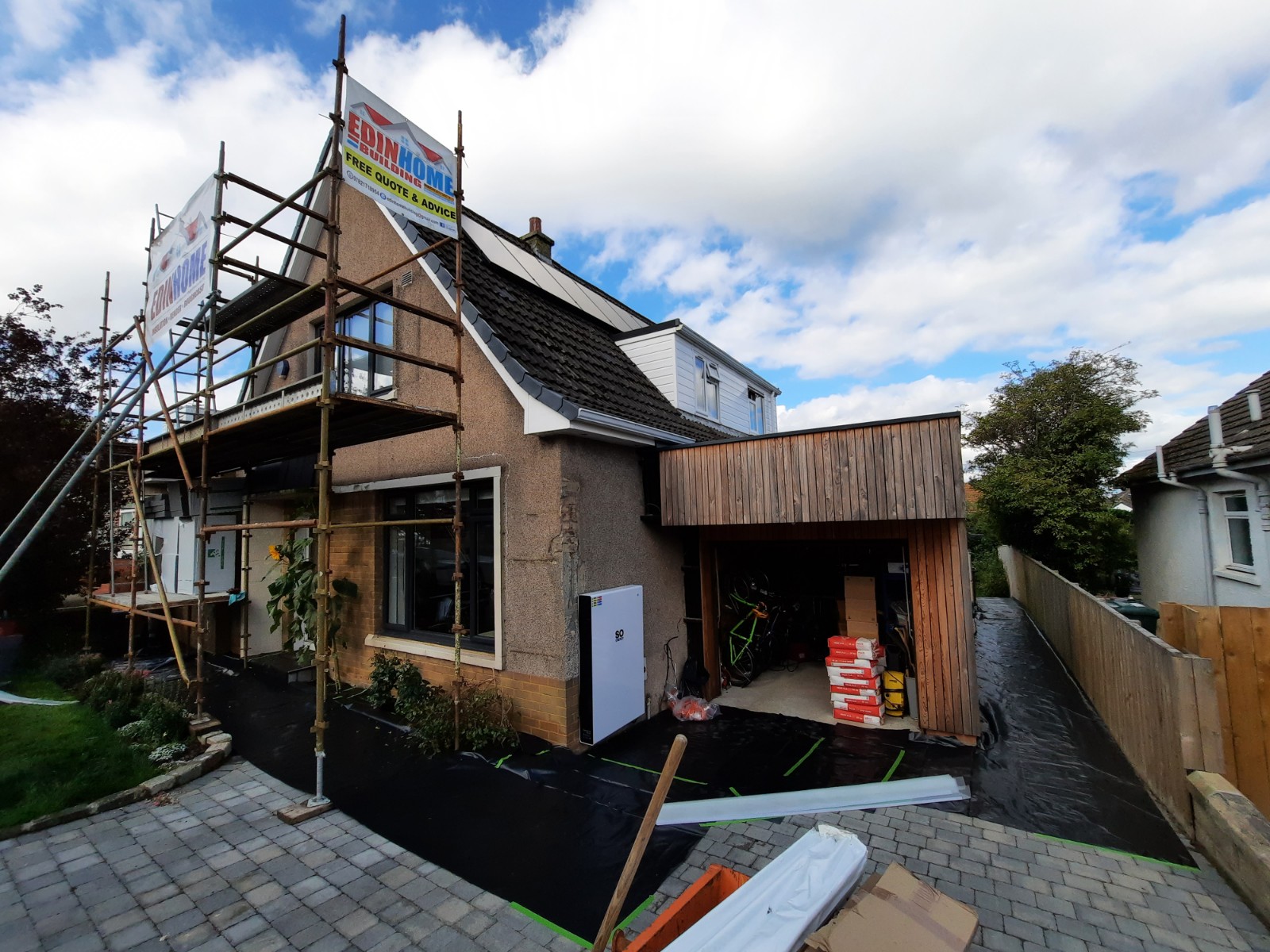 Insulation Edinburgh installed under scaffold on multi-storey wall