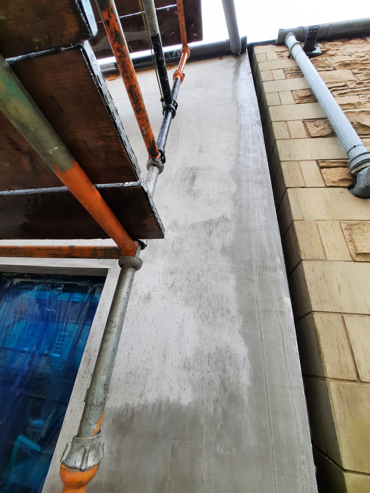 external wall insulation Edinburgh under preparation on tall wall