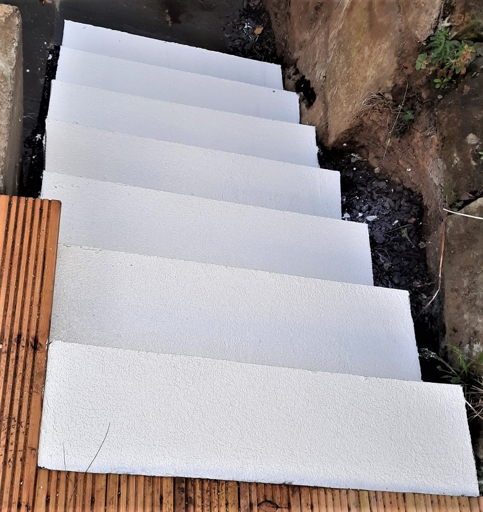 roughcast render repair with polystyrene boards for base layer
